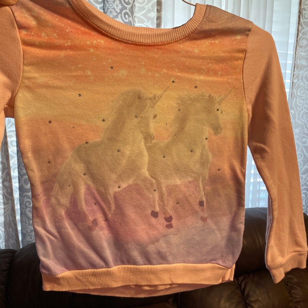 Three sweatshirts for girls.